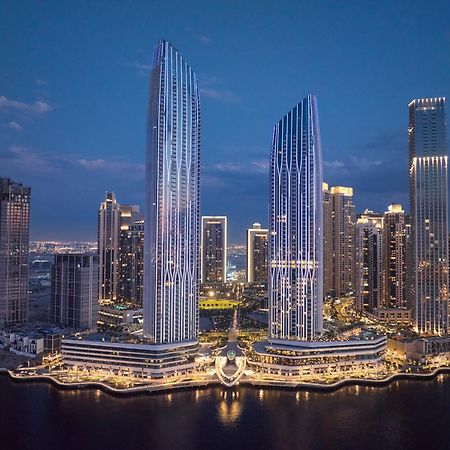 Address Creek Harbour Hotel Dubaj Kültér fotó The complex at night
