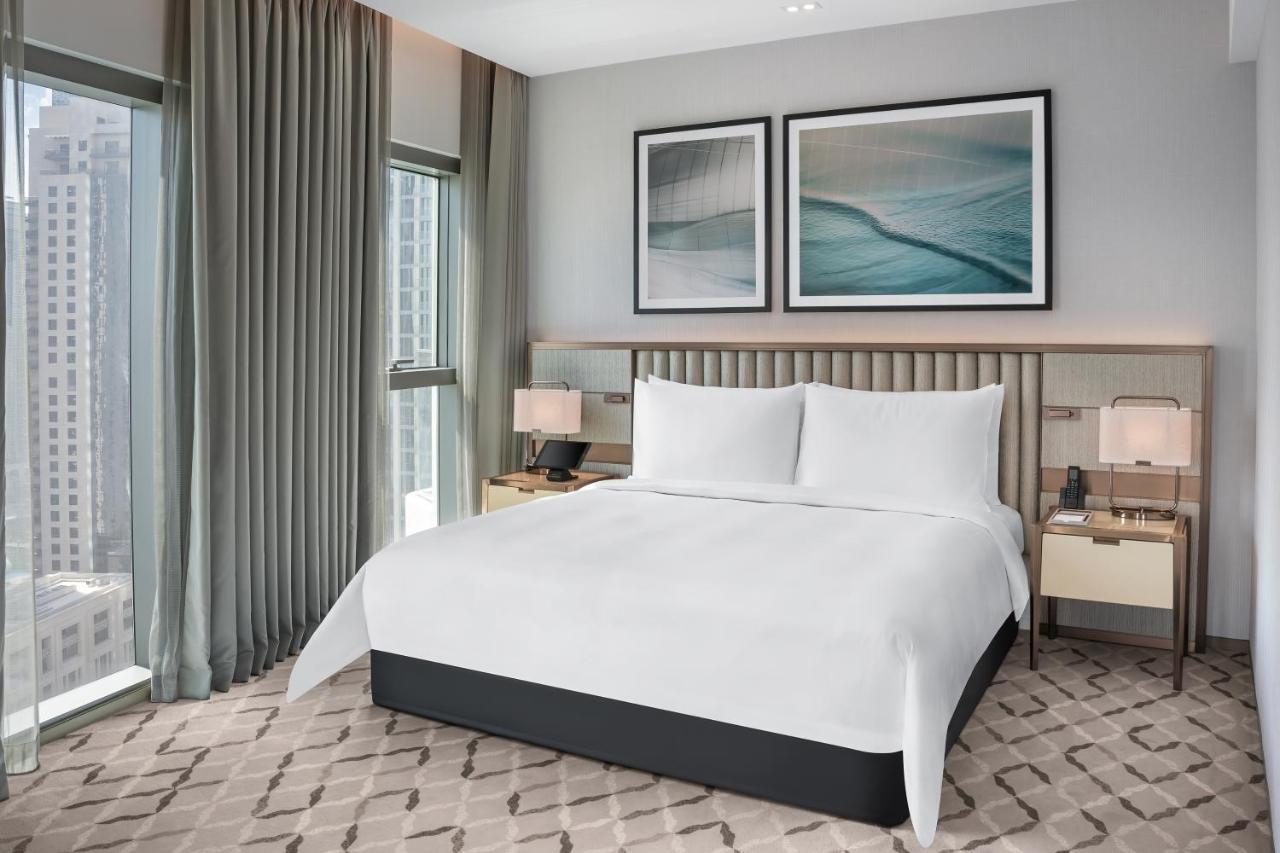 Address Creek Harbour Hotel Dubaj Kültér fotó A bedroom at the hotel