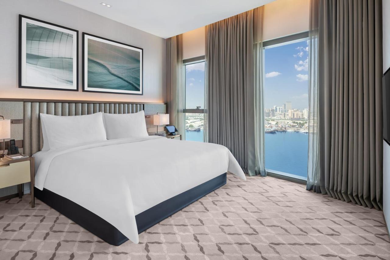 Address Creek Harbour Hotel Dubaj Kültér fotó A bedroom at the hotel