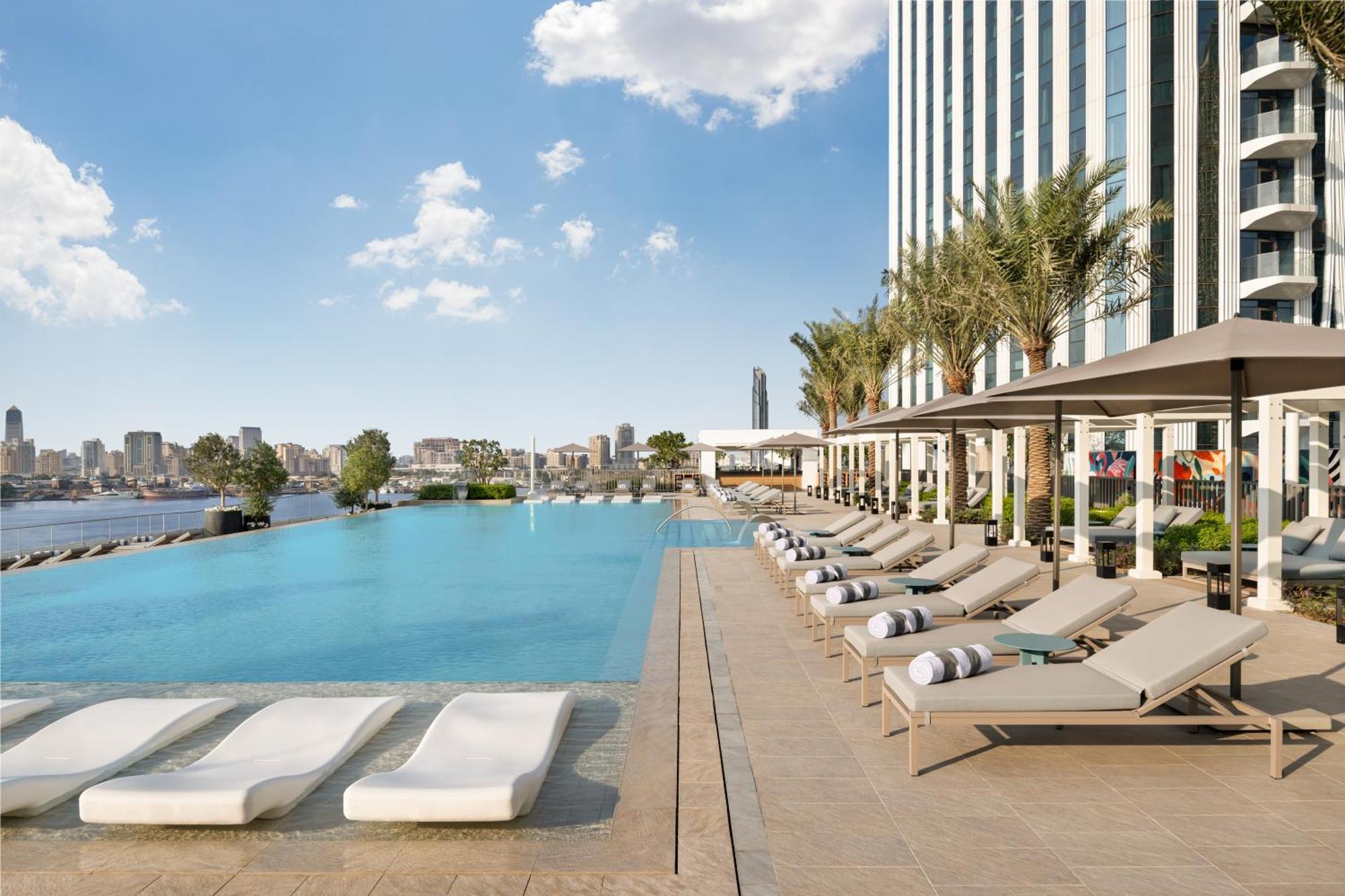 Address Creek Harbour Hotel Dubaj Kültér fotó The swimming pool at the hotel
